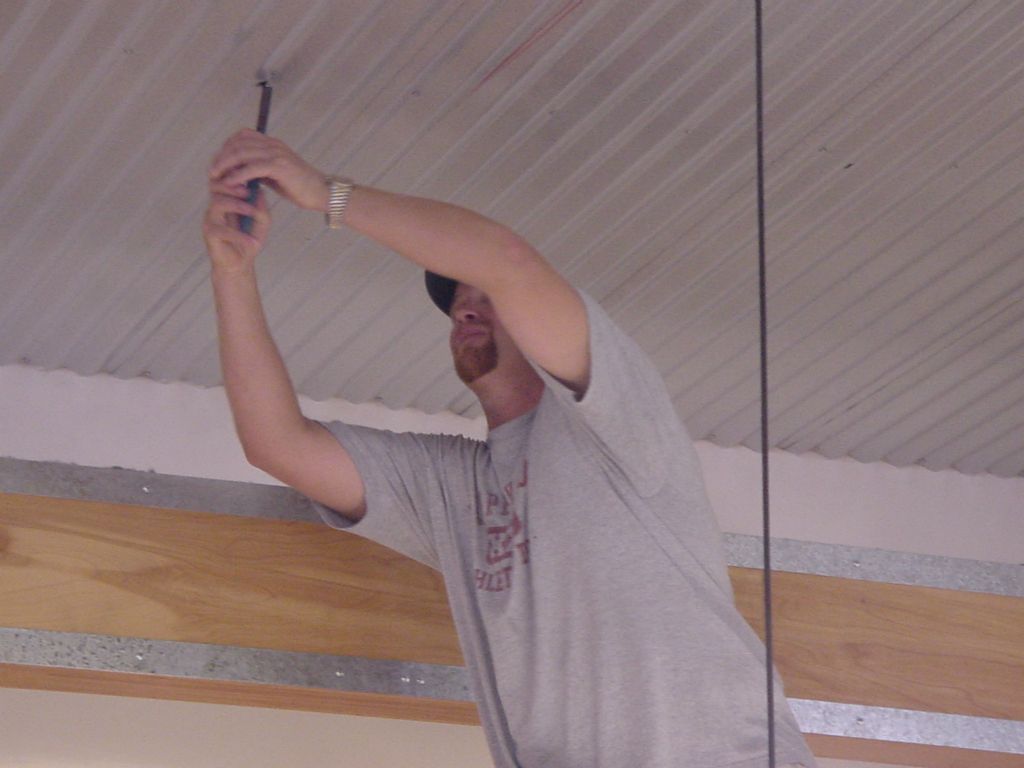SECURING THE ALL THREAD RODS to the ANCHORS ABOVE